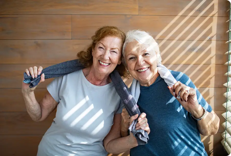 Two women after having same day cataract surgery on both eyes.